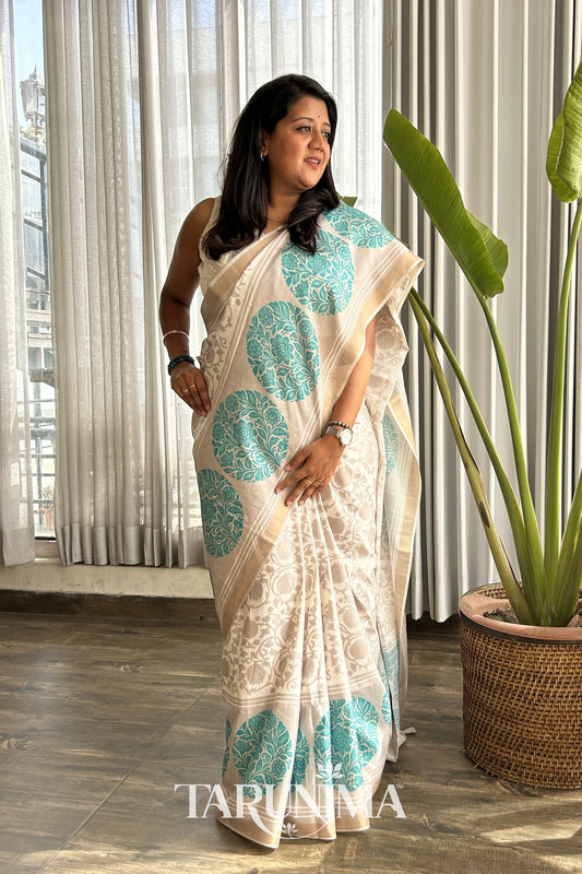 Tarini - ivory cotton silk saree with cyan paisley