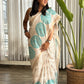 Tarini - ivory cotton silk saree with cyan paisley